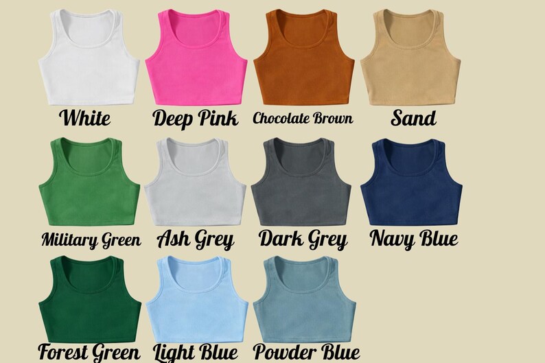 May include: A collection of crop tops in various colors, including white, deep pink, chocolate brown, and sand. Other colors are military green, ash grey, dark grey, navy blue, forest green, light blue, and powder blue. Each top has a scoop neck.