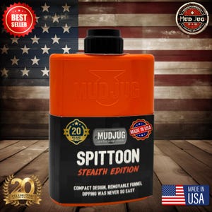 May include: Orange plastic container with a black lid and a black label that says "MUDJUG portable spittoons SPITTOON STEALTH EDITION COMPACT DESIGN, REMOVABLE FUNNEL DIPPING WAS NEVER SO EASY". The container is in front of an American flag.