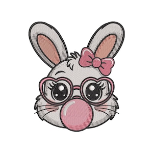 May include: Embroidered design of a cute bunny face with heart-shaped glasses and a pink bow. The bunny is blowing a pink bubble. The design is in shades of gray, pink, and black.