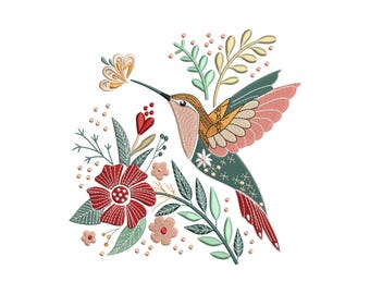 May include: Embroidered design of a hummingbird with outstretched wings, feeding from a flower. The bird features shades of brown, pink, and green, surrounded by red and pink flowers, green leaves, and small yellow accents. The design is set against a white background.