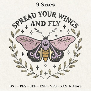 May include: Embroidered design featuring a moth with pink and black wings, surrounded by a laurel wreath and stars. The text "SPREAD YOUR WINGS AND FLY" is arched above the moth. The design is available in 9 sizes.
