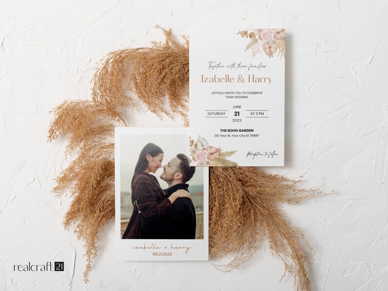 May include: Wedding invitation suite featuring a photo card and invitation with text "Izabelle & Harry". The invitation includes details for the wedding on June 21, 2023, at 3 PM. The design incorporates floral elements and a boho theme.