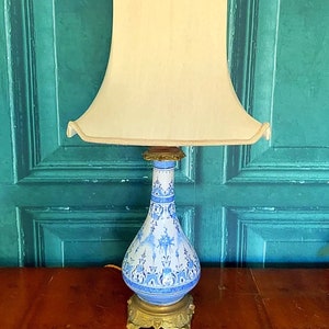 A beautiful hand painted vase lamp conversion