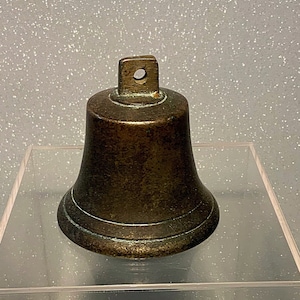 A small  and authentic English antique bronze bell