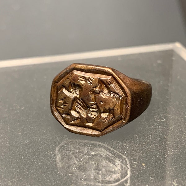 A stunning 16th century bronze signet ring