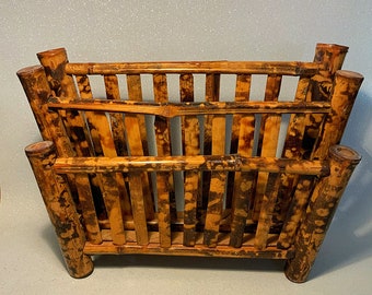 A beautiful scorched bamboo letter rack or desk tidy