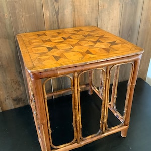 A bamboo and parquetry side table
