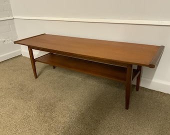 mid century surf board, teak coffee table