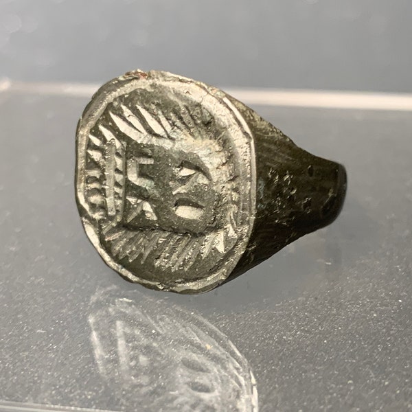 A stunning 16th century bronze signet ring