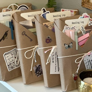 Four wrapped blind date with a book mystery books leaning against one another, ready to be gifted to a book reader.