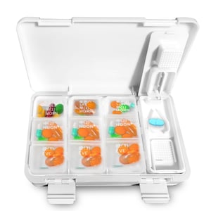 Compact 7-Day Pill Organizer with Built-in Cutter and Crusher for Travel - Secure Medication Management, White, Plastic - 7"x4.5"x1.75"
