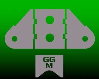 Op de afbeelding: Een driedimensionale puzzel in de vorm van een wolk met drie groene cirkels. De puzzelstukken zijn verbonden door een reeks kleine, rechthoekige uitsnijdingen. Onder de puzzel bevindt zich een grijs rechthoek met de tekst "GGM" in wit.