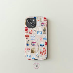 May include: A phone case featuring a repeating pattern of vintage milk cartons, bottles, and jugs in red, blue, and white on a beige background. The case has a glossy finish and a camera cutout.