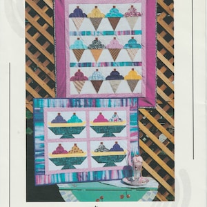May include: A quilt pattern for a "Soda Shoppe Set" featuring ice cream cones and sundaes. The pattern is from "Around the Block Quilt Designs".