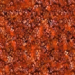 May include: A fabric with a repeating floral pattern in shades of orange, brown, and cream. The design features stylized flowers and swirling vines, creating a textured, vintage look. The overall effect is warm and inviting.