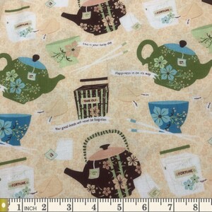May include: Fabric with a repeating pattern of teapots, teacups, and fortune cookie packaging. The teapots are brown and green with floral designs. The teacups are blue and green. The text includes "Fortune", "Take Out", and inspirational phrases.