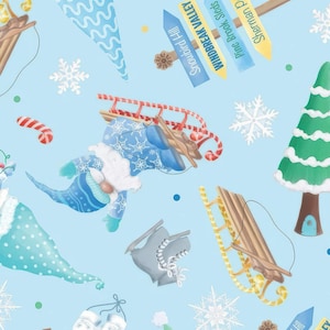 May include: A light blue fabric with a winter theme. The design includes gnomes, snowflakes, sleds, ice skates, and directional signs with text like "Snowbird Hill" and "Windbreak Valley". The image also features a ruler with inch measurements.