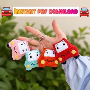 May include: Four colorful crochet car keychains in pink, blue, orange, and red, each with a white windshield and smiling face. The keychains are attached to silver rings. Text above reads "INSTANT PDF DOWNLOAD".