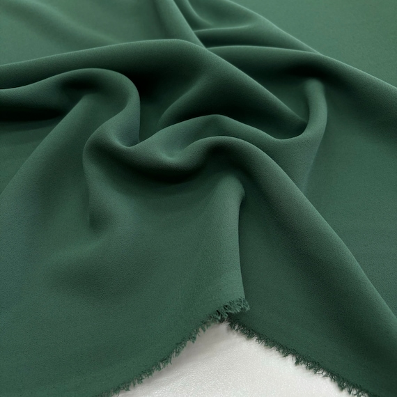 dark green dress fabric Buy Emerald Dark Green Solid Satin Fabric Online at TradeUNO – TradeUNO  Fabrics main image 1