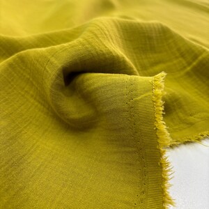 Olive Green Cotton Muslin Fabric – Double-Layered Soft Lightweight for Dresses & Clothing | 140 cm