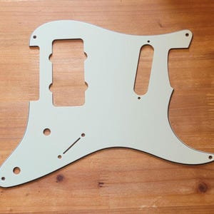 Jazzmaster bridge, slanted strat neck route, 2 knobs and switch - Strat Pickguard