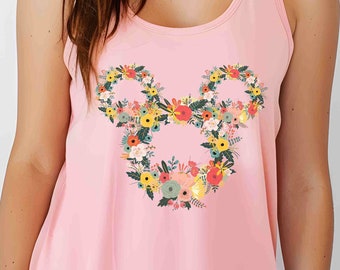 May include: A pink tank top with a floral Mickey Mouse design. The flowers are in shades of pink, yellow, orange, and green.