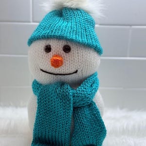 Handmade Knitted Snowman with Blue Hat & Scarf: Cozy Christmas Decor