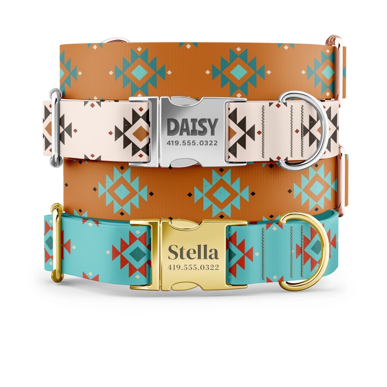 May include: Three dog collars with geometric patterns in shades of orange, white, blue, and red. The collars have silver and gold buckles with personalized names and phone numbers: "Daisy 419.555.0322" and "Stella 419.555.0322".
