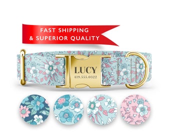 May include: A floral dog collar with a light blue background and gold hardware. The collar features a repeating pattern of white and pink flowers. The buckle is engraved with the name "LUCY" and a phone number. Four circular fabric samples with floral patterns are below the collar.