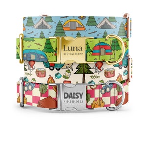 May include: Three dog collars with different camping-themed patterns. The top collar is blue with white tents and trees. The middle collar is green with white tents and trees. The bottom collar is red and white checkered with a campfire and a tent. Each collar has a metal buckle with a name and phone number engraved on it. The top buckle says "Luna 419.555.0322". The bottom buckle says "Daisy 419.555.0322".