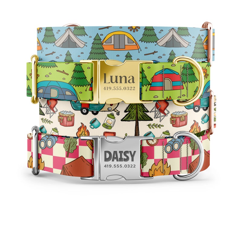 May include: Three dog collars with different camping-themed patterns. The top collar is blue with white tents and trees. The middle collar is green with white tents and trees. The bottom collar is red and white checkered with a campfire and a tent. Each collar has a metal buckle with a name and phone number engraved on it. The top buckle says "Luna 419.555.0322". The bottom buckle says "Daisy 419.555.0322".