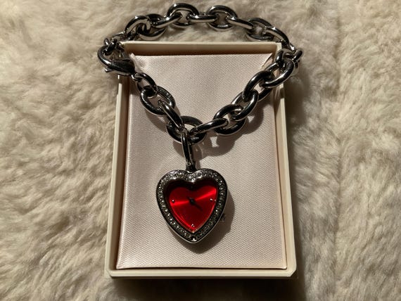 SilverTone solid link bracelet with a GUESS Watch… - image 1