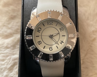 SilverTone FMD Quartz watch with rectangular rhinestones and white silicone band.Unused.