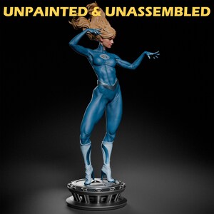 May include: Unpainted and unassembled plastic model kit of a female superhero figure in a blue suit with a white symbol on the chest. The figure is standing on a circular base with a textured surface.
