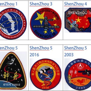 May include: Six embroidered patches depicting the Shenzhou spacecrafts. The patches are circular and feature a variety of colours, including red, blue, yellow, and white. The patches feature Chinese characters and the text "Shenzhou" in English.