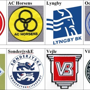 May include: A collection of eight embroidered sports team patches featuring various logos and text including AaB Fodbold, AC Horsens, Lyngby BK, Odense OB, Randers FC, Sonderjyske, Vejle, and Viborg FF, displayed in a grid with diverse shapes and colors.