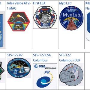 May include: A collection of nine embroidered patches, each representing a different module or component of the International Space Station. The patches feature various designs, including spacecraft, astronauts, flags, and text. The patches are arranged in a grid pattern on a white background.