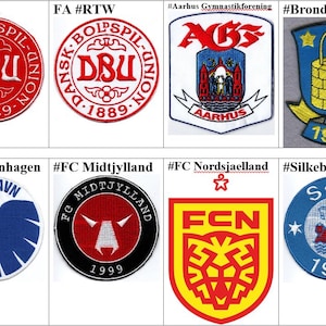 May include: A collection of eight embroidered patches featuring logos of Danish football clubs. The patches display various colors and designs, including text and emblems. The clubs include DBU, Aarhus, Brondby, Copenhagen, Midtjylland, Nordsjaelland, and Silkeborg.