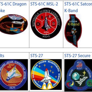 May include: A collection of nine NASA space shuttle mission patches. The patches are circular and feature various designs, including the space shuttle, the American flag, and text. The patches are arranged in a grid of three rows and three columns.