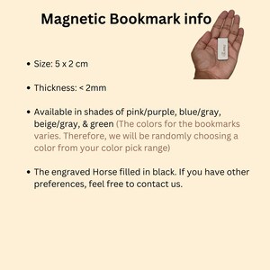 May include: A small, silver magnetic bookmark with the word "Anns" printed on it. The bookmark is 5 cm by 2 cm and less than 2 mm thick. It is available in shades of pink/purple, blue/gray, beige/gray, and green. The bookmark features an engraved horse filled in black.