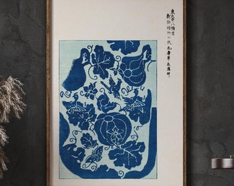 May include: A blue and white vintage Japanese woodblock print of a gourd vine with birds and flowers. The print is framed in a wooden frame and has Japanese text in the top right corner.