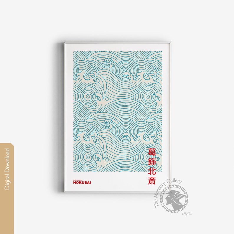 May include: A blue and white print of waves with the text "HOKUSAI" and "葛飾北斎" in red. The print is framed in a white frame.