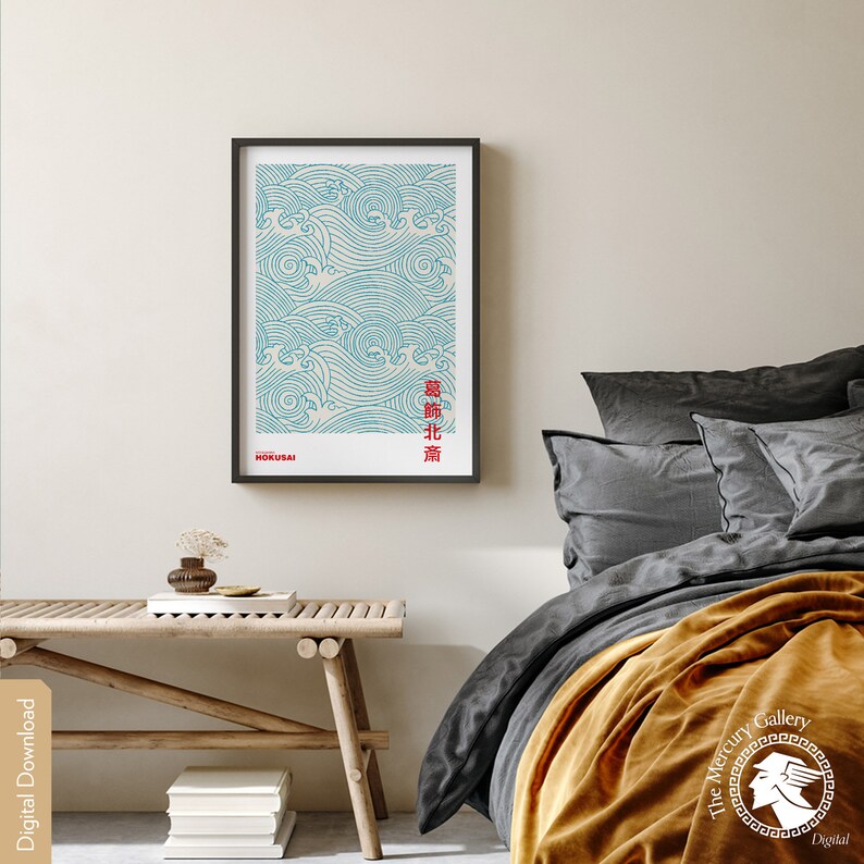 May include: A framed print of a blue and white wave pattern with the text "HOKUSAI" and Japanese characters in red. The print is hanging on a white wall above a wooden bench.