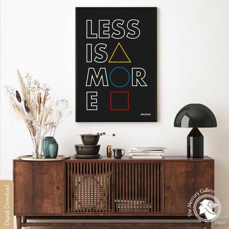 May include: A black and white poster with the text "LESS IS MORE" in white letters. The letters are stylized with geometric shapes in yellow, blue, and red.