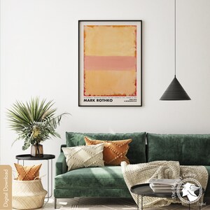 May include: A digital download of a poster featuring an abstract painting by Mark Rothko. The painting is a large rectangle with three horizontal bands of color: a light yellow band at the top, a pink band in the middle, and a darker yellow band at the bottom. The poster also includes the text "Mark Rothko" and "A Retrospective" in black.