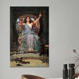 May include: A framed canvas print of a classical painting. The artwork depicts a woman in a flowing blue gown seated on a throne, holding a cup and a wand. The background features a circular window and ornate architectural details.