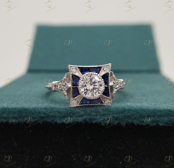 Bague ancienne en diamant rond de 1,00 ct, halo de saphirs bijoux