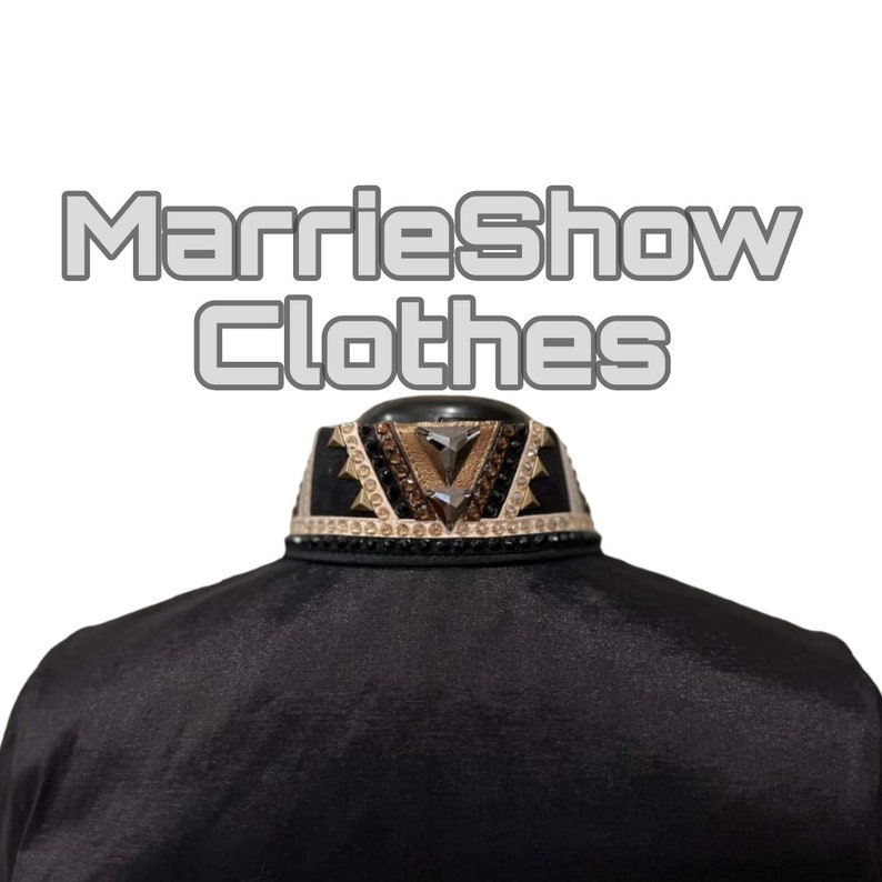 May include: Black garment with an embellished collar. The collar features a geometric design with gold, brown, and clear gemstones. The text "MarrieShow Clothes" is displayed above the garment.