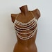 see more listings in the Pearl Body Ketting section
