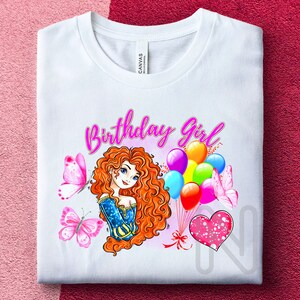 May include: White t-shirt with a pink "Birthday Girl" text and a cartoon illustration of a girl with red hair holding balloons and butterflies.